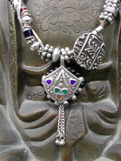 Detail of Dowry Bracelet on Bronze Buddha