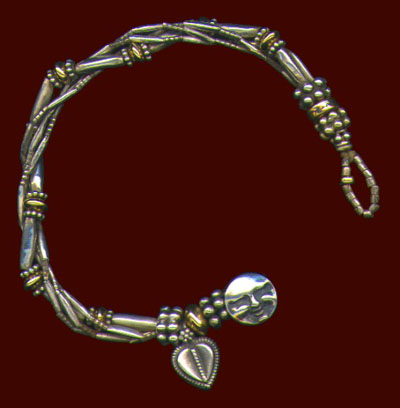 4 Strand Silver and Gold Bracelet 4 Strand Silver and Gold Bracelet