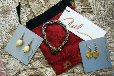 Private Brighton, UK collection: 4 Strand Silver and Gold Bracelet, Antique Ivory Earrings, 18K gold wash on copper earrings Private Brighton, UK collection: 4 Strand Silver and Gold Bracelet, Antique Ivory Earrings, 18K gold wash on copper earrings