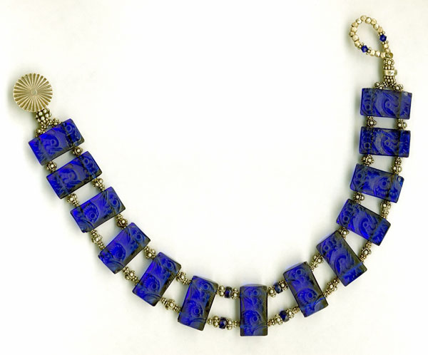 Lalique Cobalt Glass, 1900's, with Indian and Navajo Silver Lalique Cobalt Glass, 1900's, with Indian and Navajo Silver